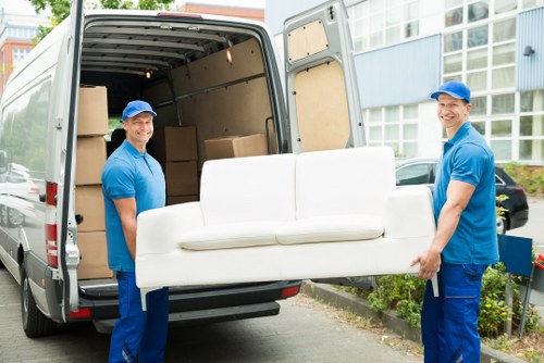 Local man with a van loading furniture for a Maidavale home move