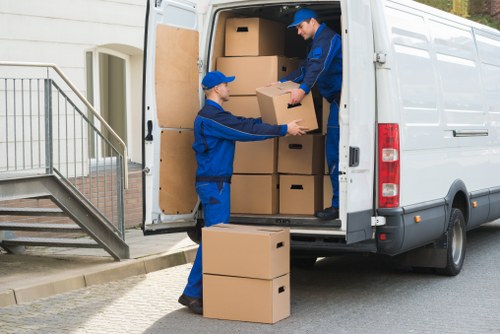 Packed boxes and furniture ready for removals in Maidavale