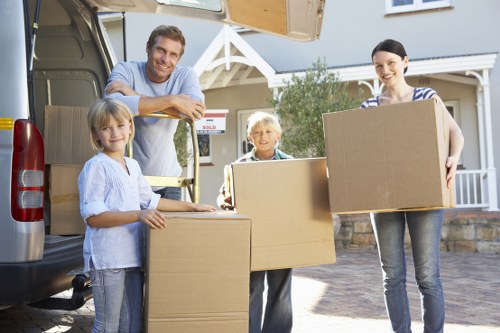 Packing and loading belongings into a van in Maidavale