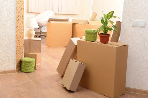 Packed boxes and household items loaded into a removals van
