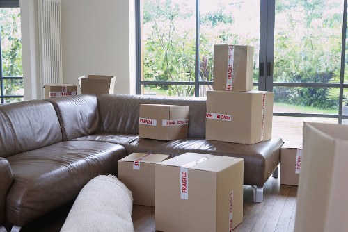 Family home move example with furniture and packed boxes